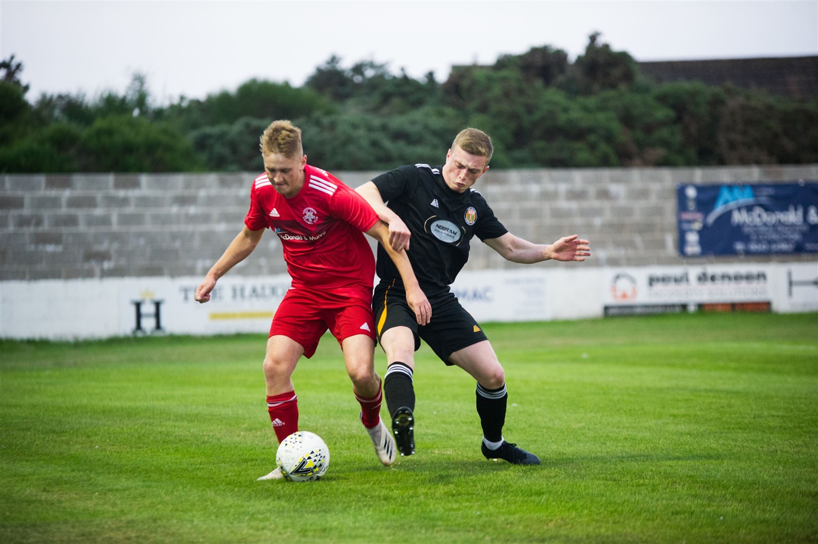 Ryan Sewell (left) netted Lossiemouth's opener against Fort William. Picture: Becky Saunderson..