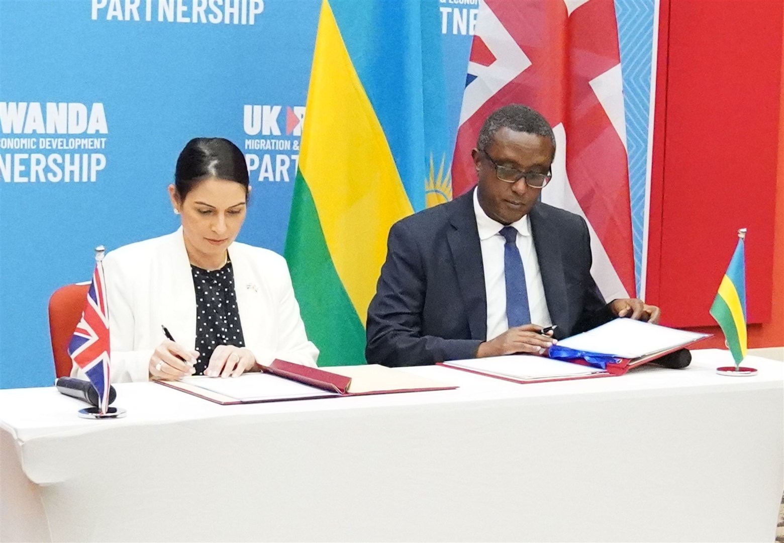 Priti Patel and Rwandan minister for foreign affairs and international co-operation Vincent Biruta signed a migration and economic development partnership in Kigali in April (Flora Thompson/PA)