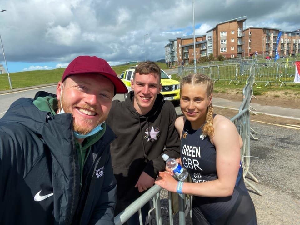 Elgin triathletes Cameron Main and Sophia Green celebrate their Euro qualification with coach Andrew Woodroffe (left).