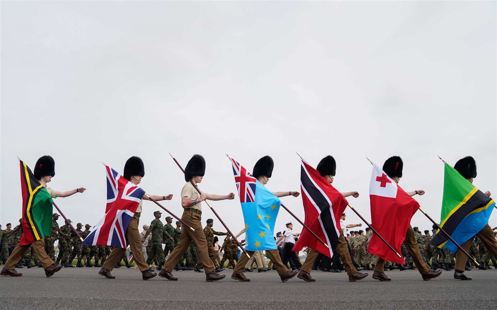Commonwealth flag carriers during a rehearsal at RAF Odiham in Hampshire (Andrew Matthews/PA)