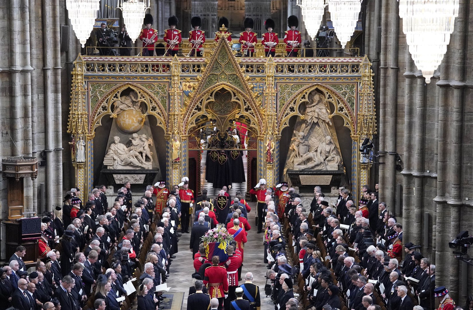 King Charles III and members of the royal family follow behind the coffin of Queen Elizabeth II (Danny Lawson/PA)