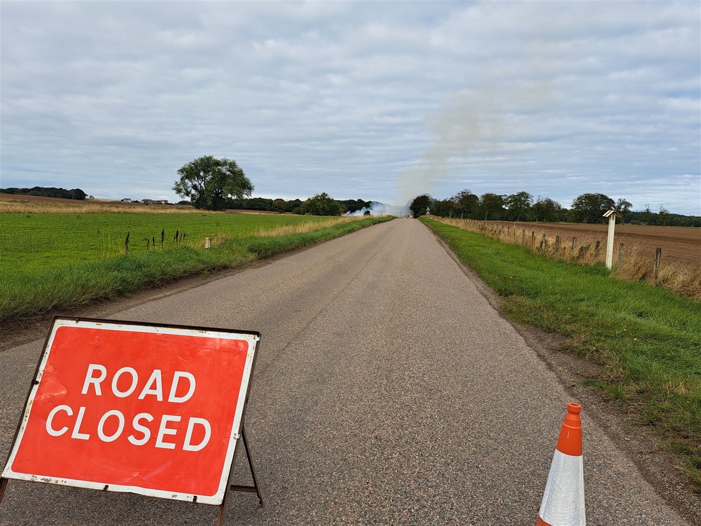 The B9012 road from Crosslots to Hopeman was closed due to the fire.