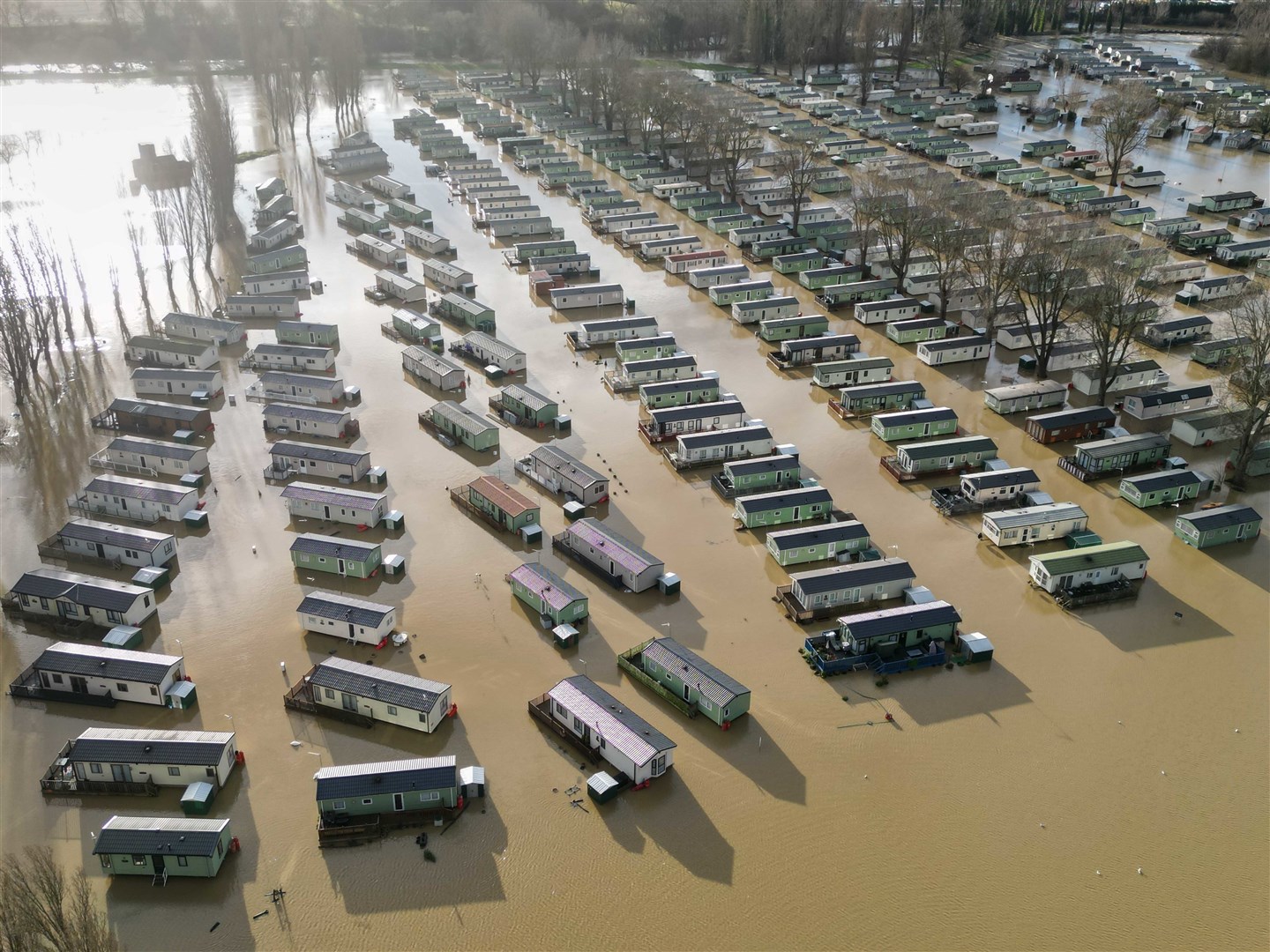 Caravans are surrounded by water at Billing Aquadrome (Jacob King/PA)