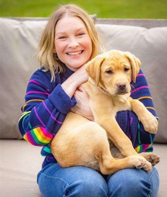 Joanna Page meets Flash. Picture: Guide Dogs UK