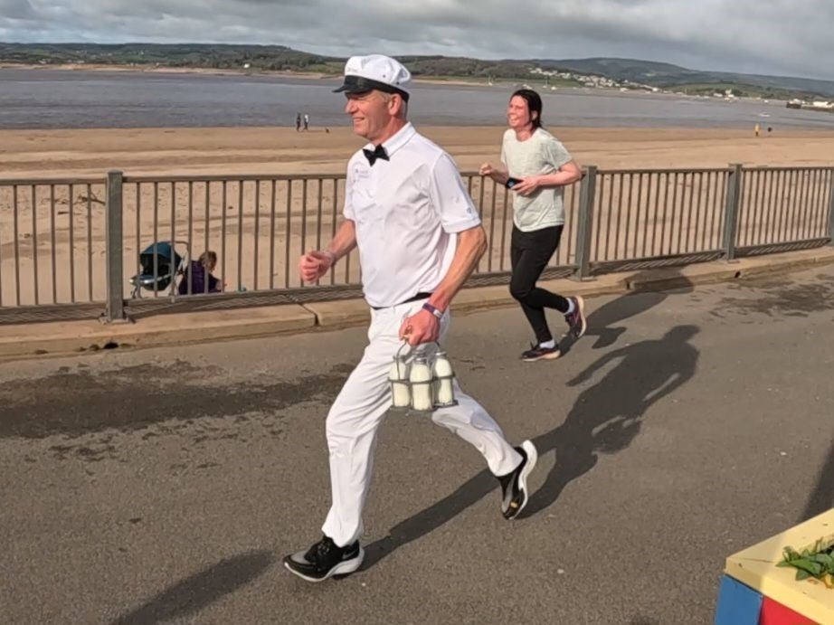Gary has already practised running long-distance in his milkman outfit. Image credit: Gary Qualter
