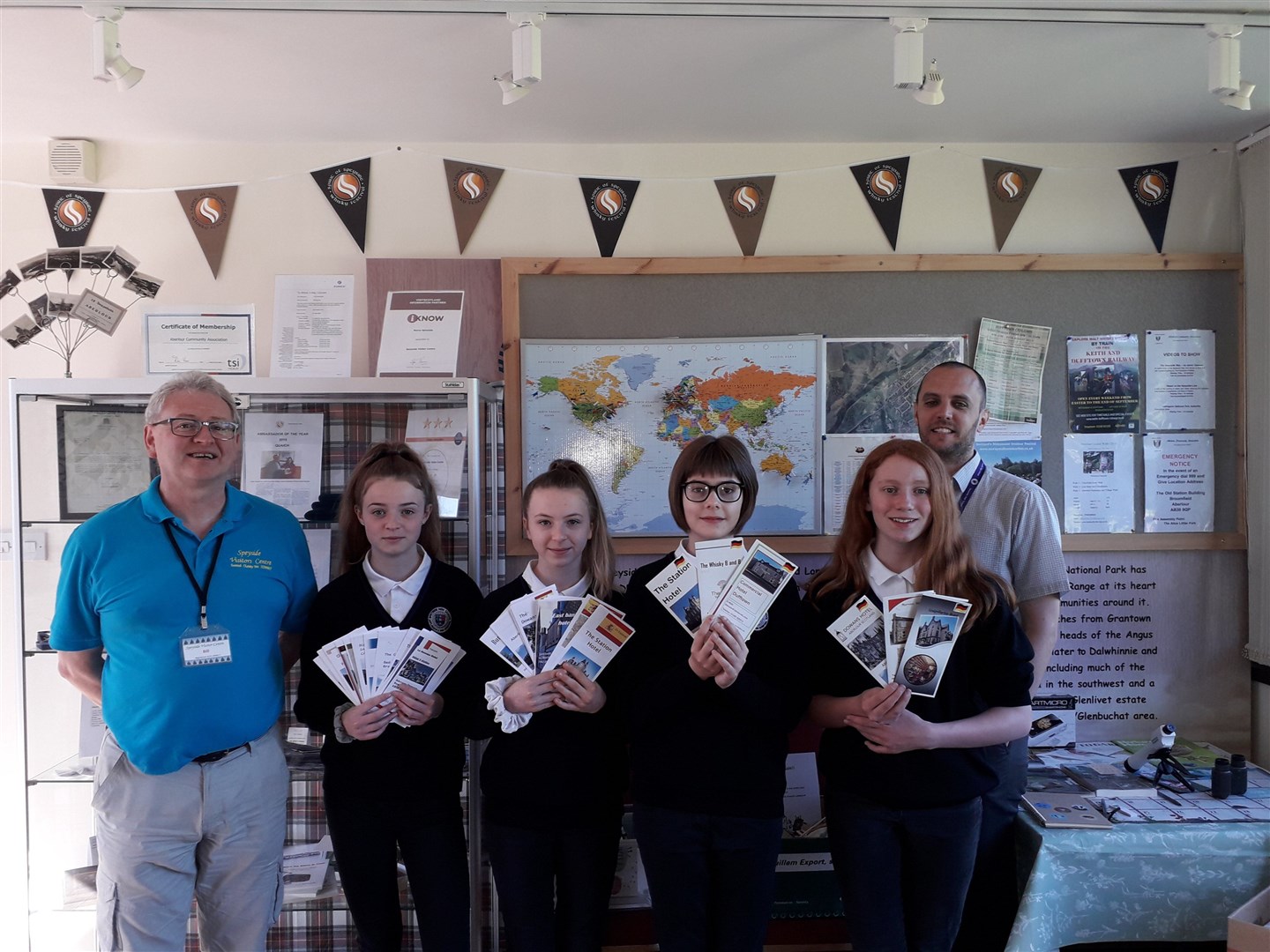 Bill Malcolm, of Speyside Visitor Centre, with S2 Speyside High pupils Reanna Stephen, Molly Bailey, Maisie Dunbar, Lucy Grant and principal teacher of modern languages David Burns.