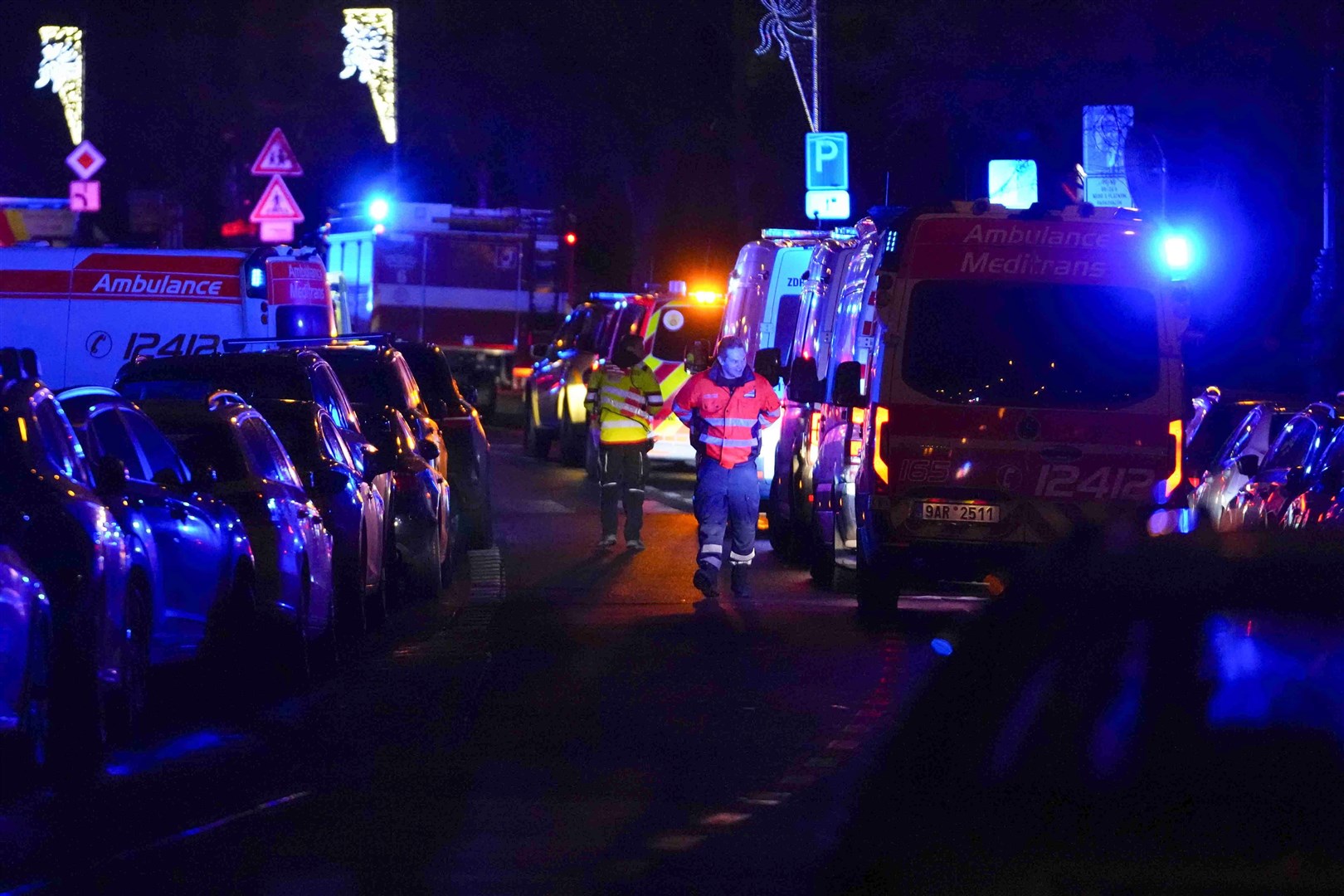 Emergency services near the building of Philosophical Faculty of Charles University in Prague (Petr David Josek/AP)