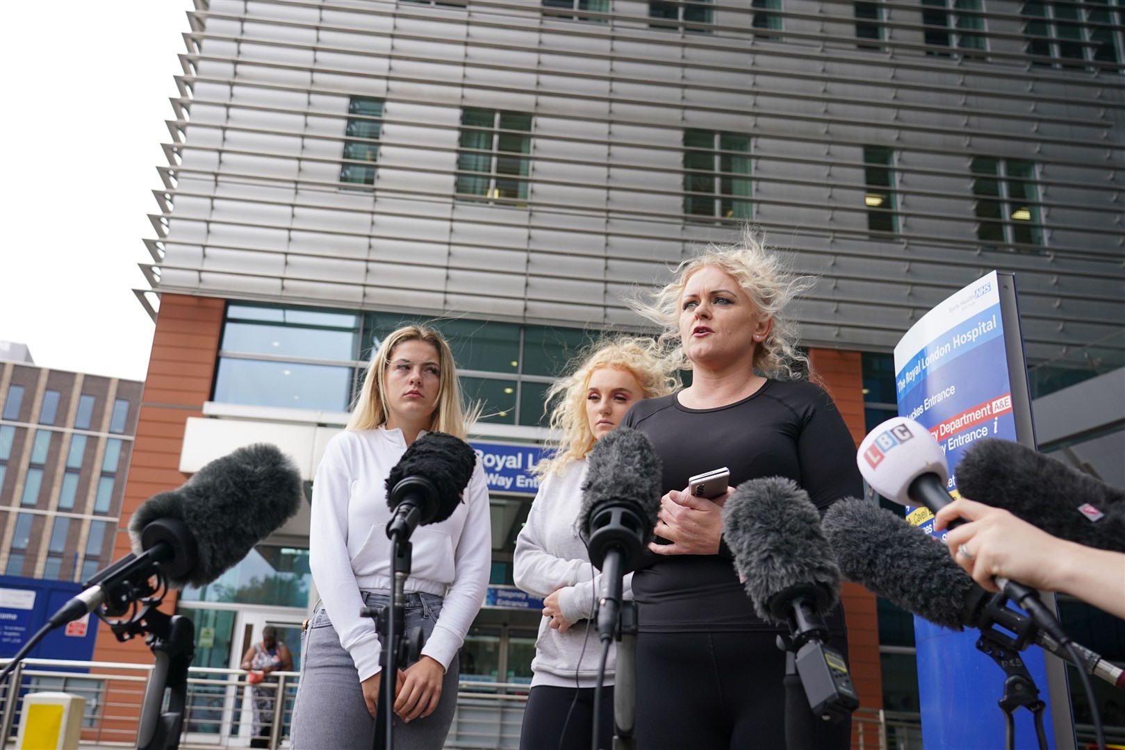 The mother of Archie Battersbee, Hollie Dance, right, speaks to the media outside the Royal London Hospital in Whitechapel, east London (Dominic Lipinski/PA)