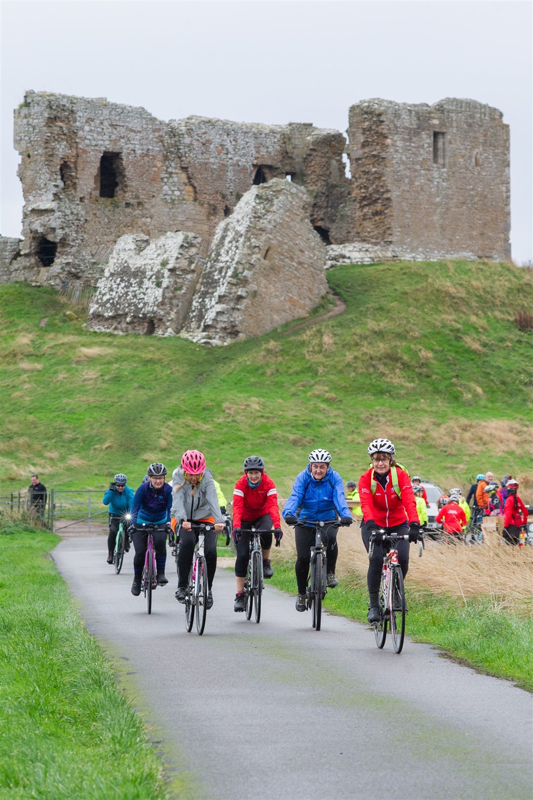 The Breeze cyclists leaving Duffus Castle. Picture: Daniel Forsyth.