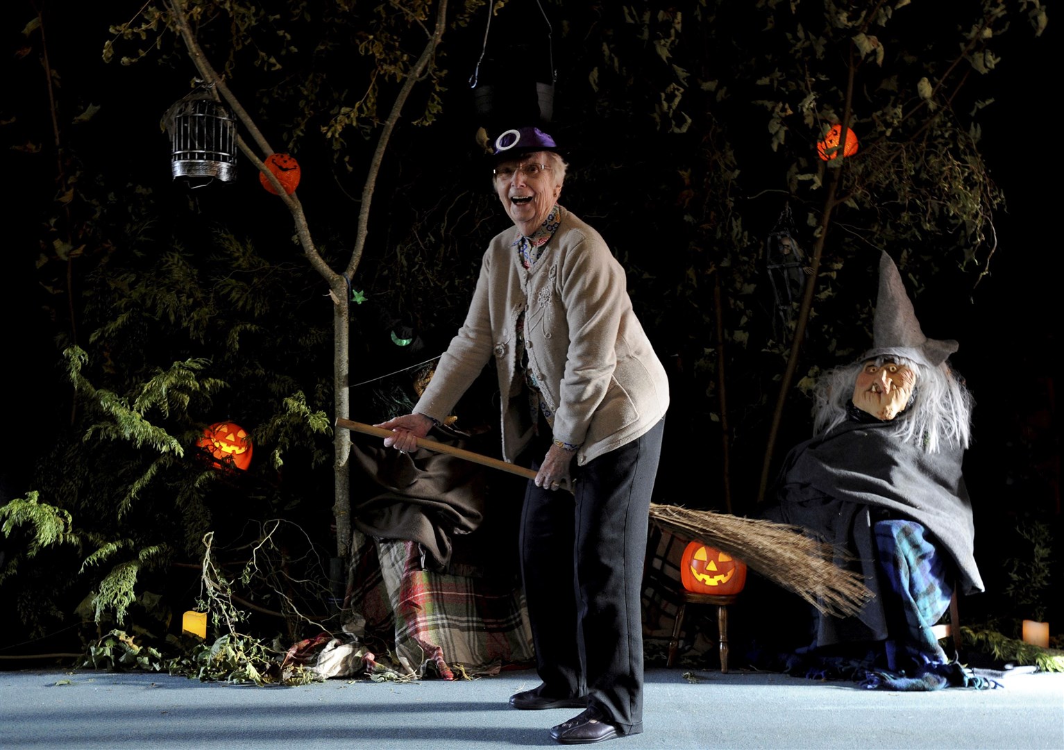 Anderson care home resident Rita Grigor tries out her seasonal mode of transport for Halloween. Picture: Eric Cormack.