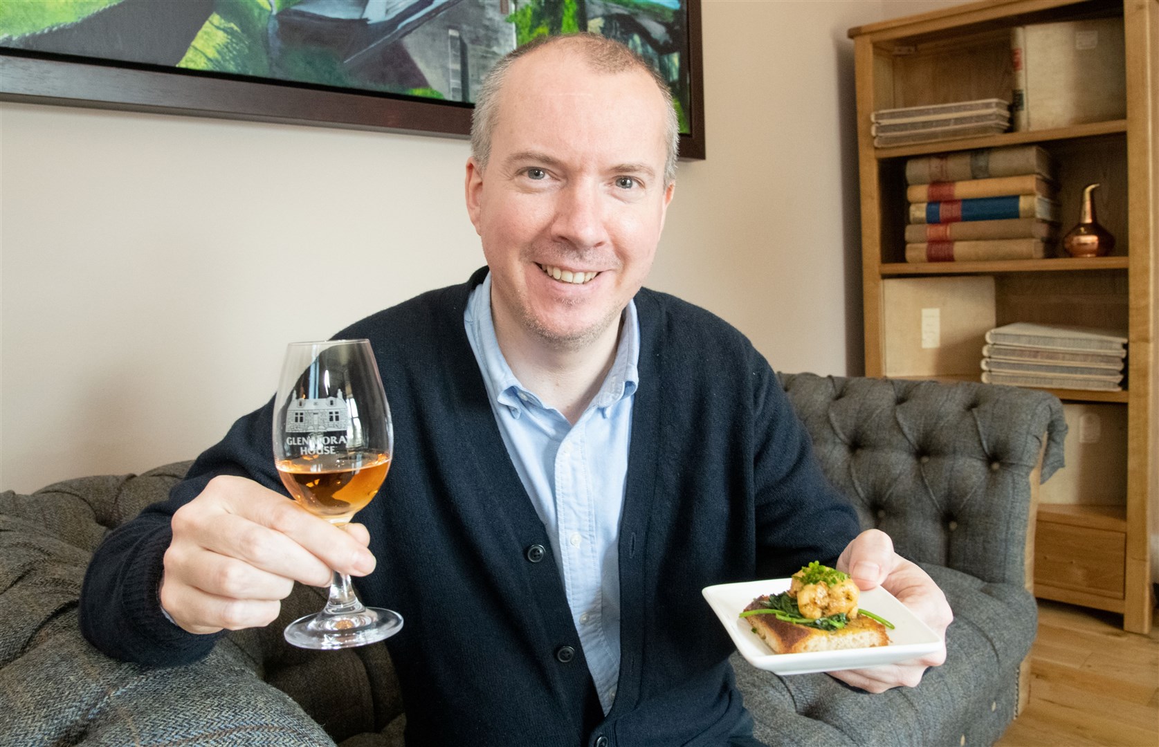 Glen Moray's Global Brand Ambassador Iain Allan with a Glen Moray dram and a plate of Tapas, prepared by Orrin.From Spain to Speyside: Tapas and Tasting at Glen Moray. Picture: Daniel Forsyth.