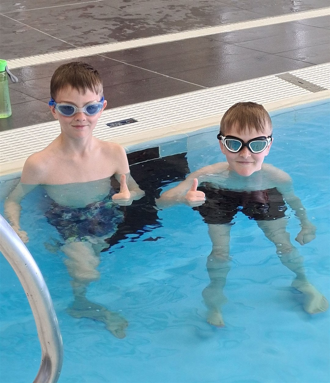 Archie and George Melville are aiming to swim more than 4500 metres each across the next six weeks.