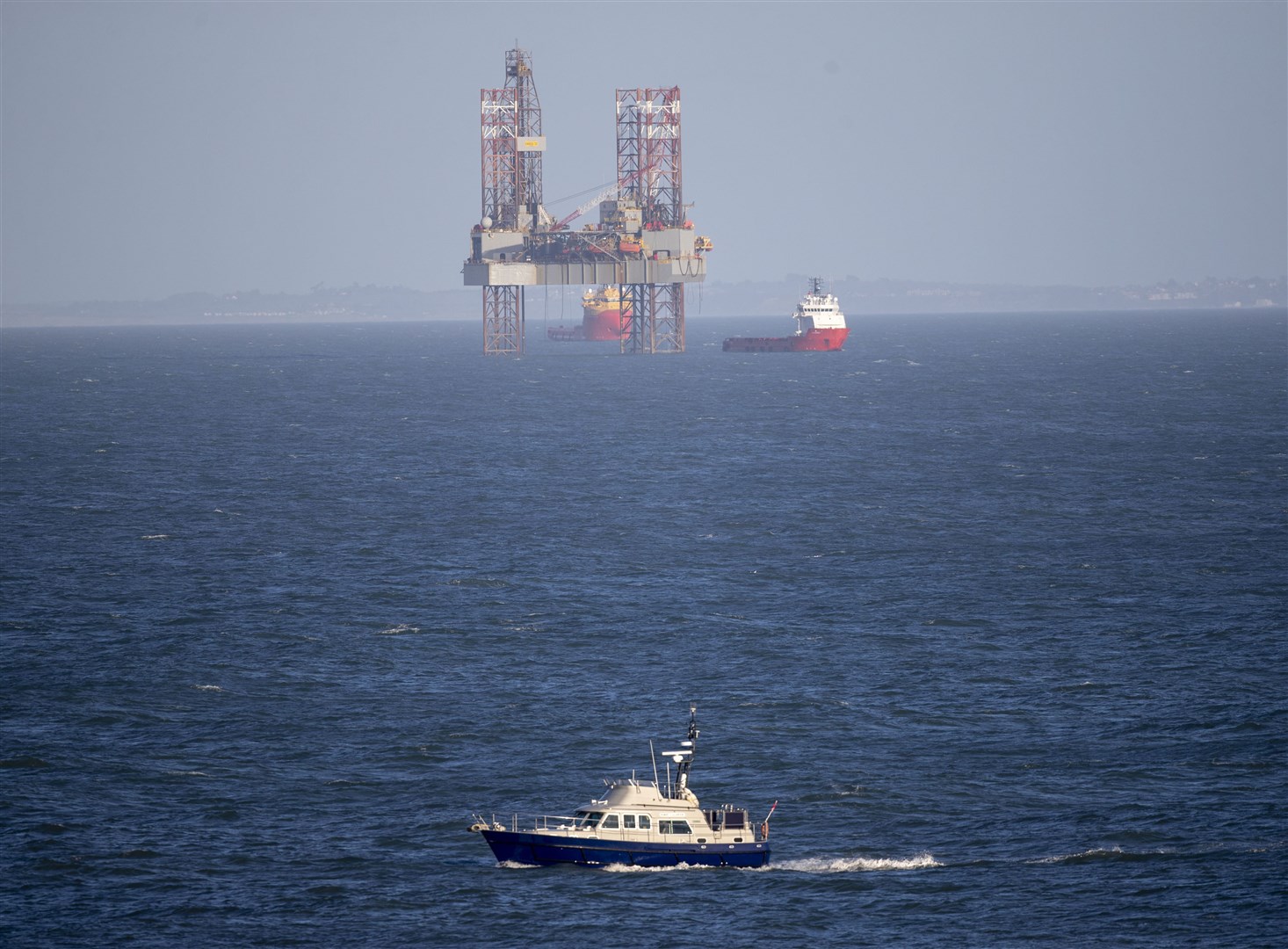 Rigs built to extract oil or gas from the sea may in future be used to inject liquified CO2 back underground (PA)