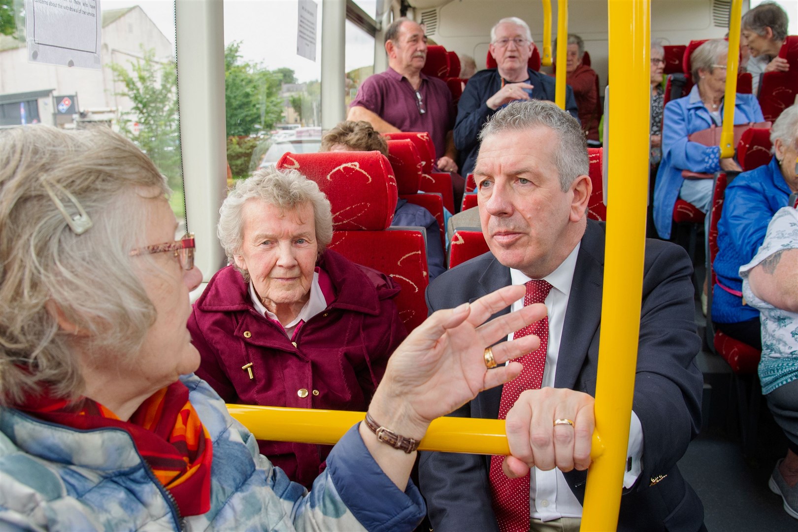 David Stewart, Highlands and Islands Labour MSP, chats to regular bus users. Picture: Daniel Forsyth. Image No.044604.
