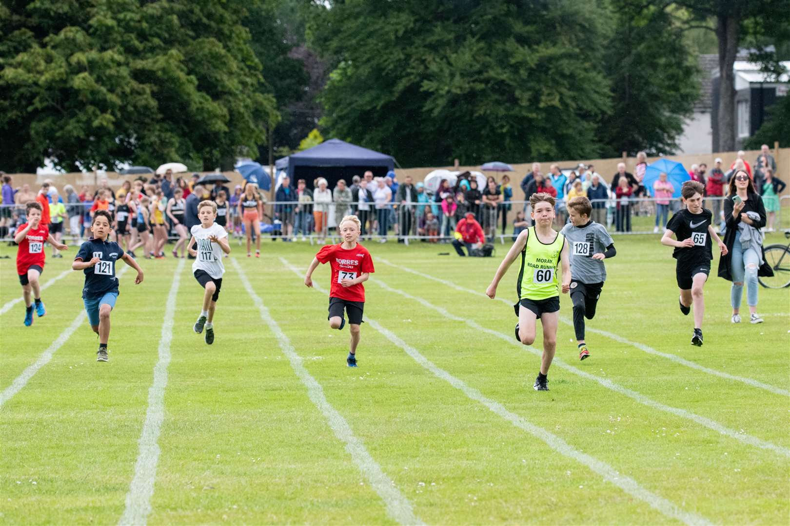 Boys 11-13's 100 meter race was won by #60 Finn Carruthers from Moray Road Runners...Forres Highland Games 2022...Picture: Daniel Forsyth..