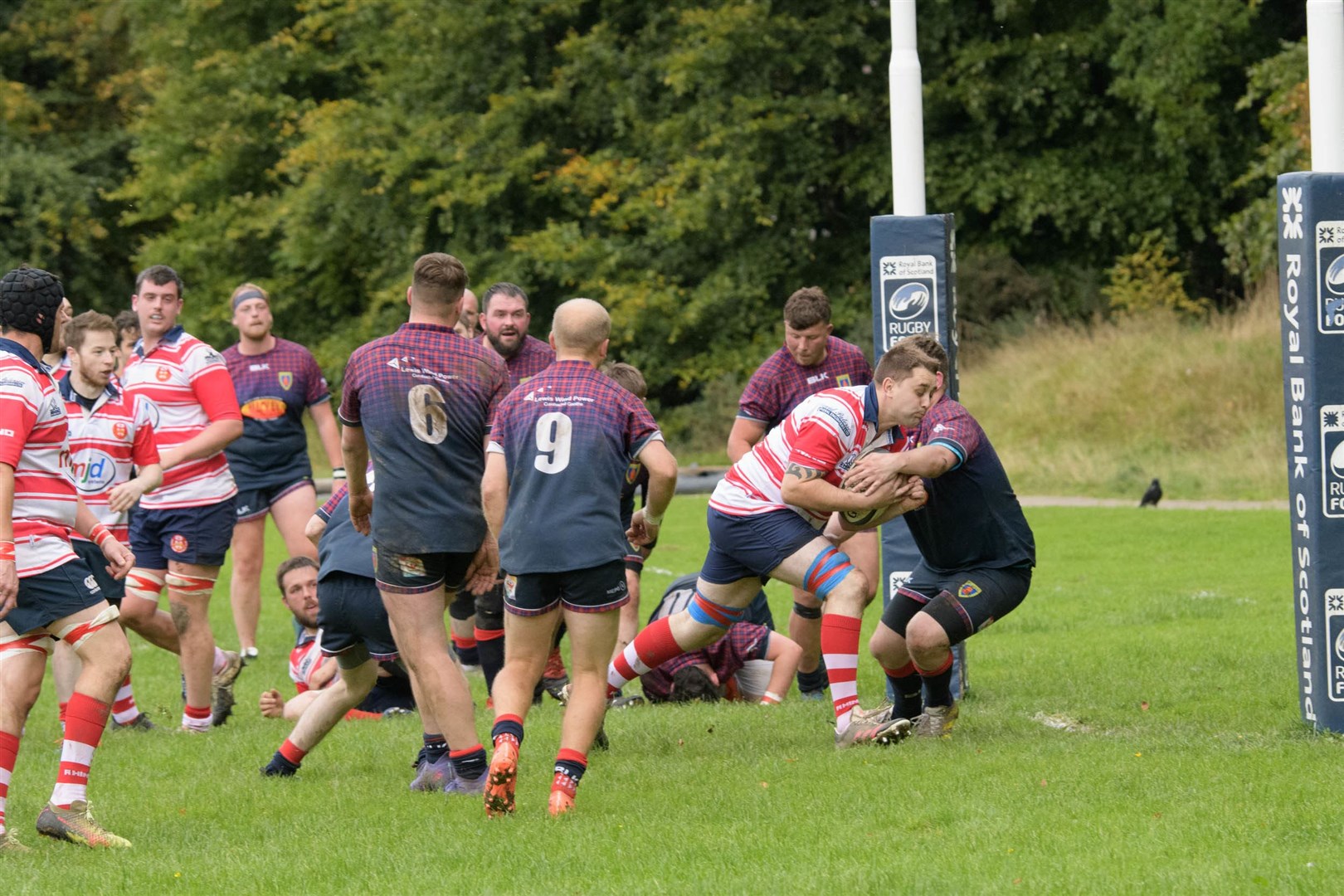 Andrew McBean breaks last tackle on way to score. Picture: Colin Little