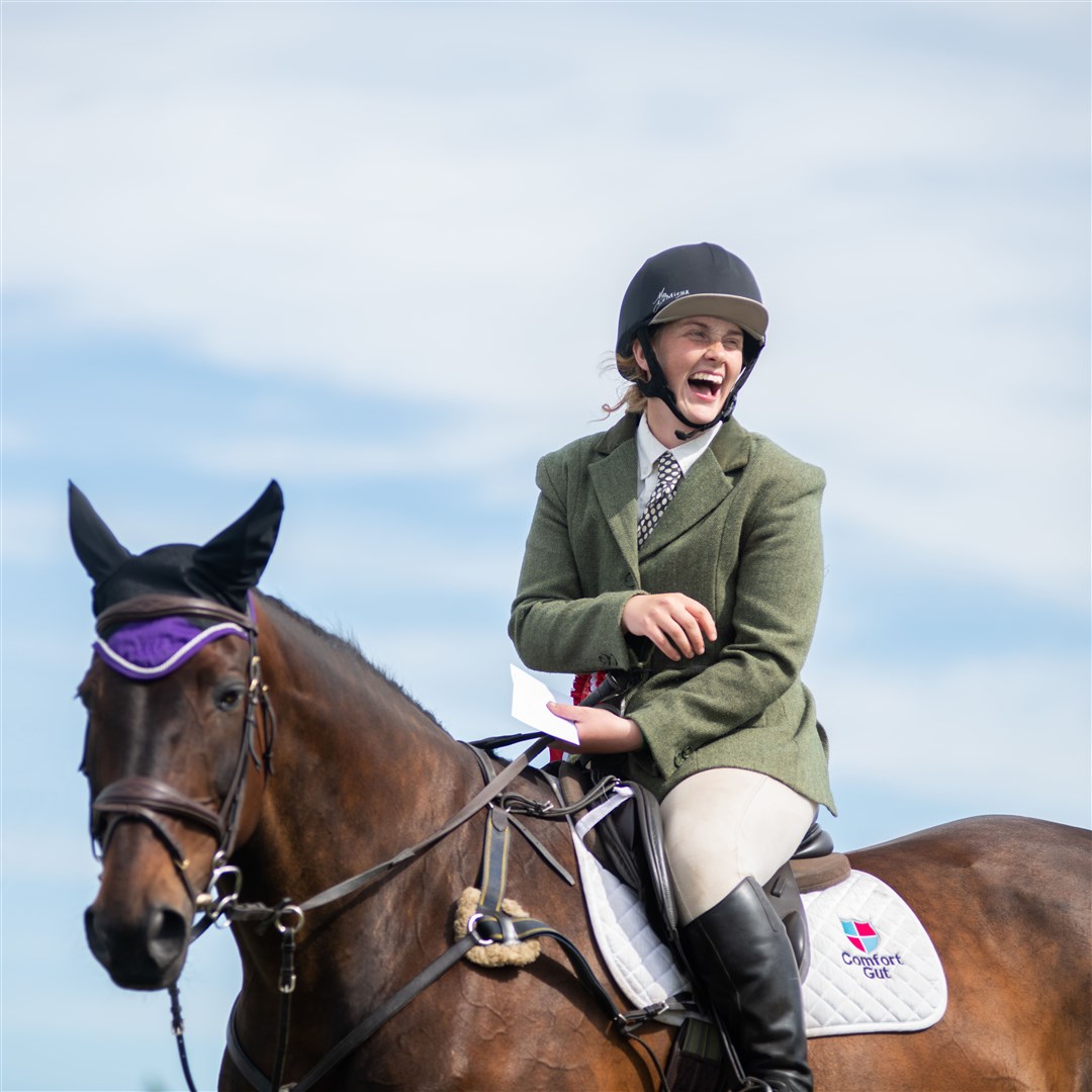 Zoe McDonald smiles as she finds out she's won the 90cm showjumping...Keith Show Sunday 2022...Picture: Daniel Forsyth..