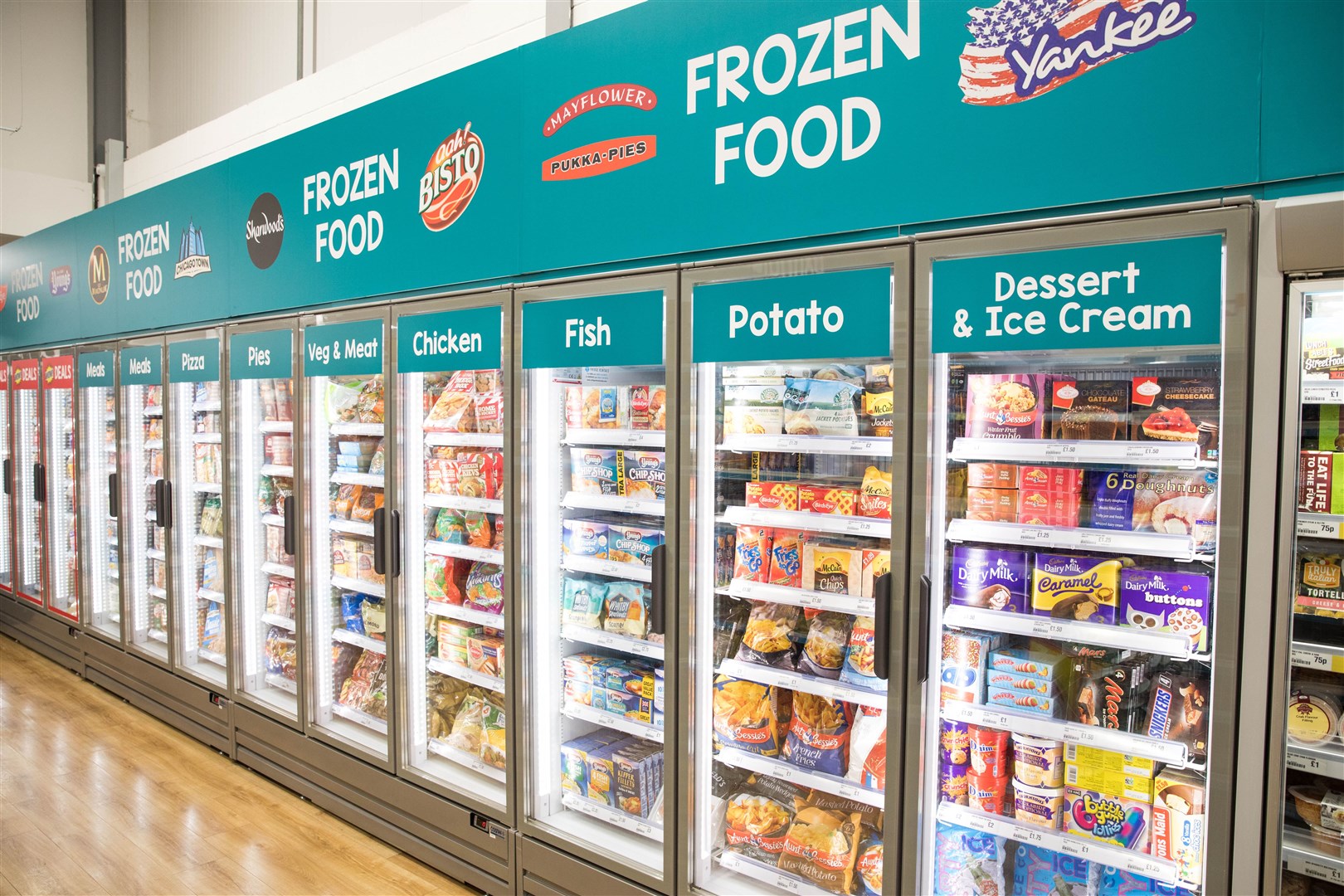 Poundland said it had seen a successful trial of five ‘shop-in-shops’ selling products ranging from luxury yogurts to frozen fish (Poundland/PA)