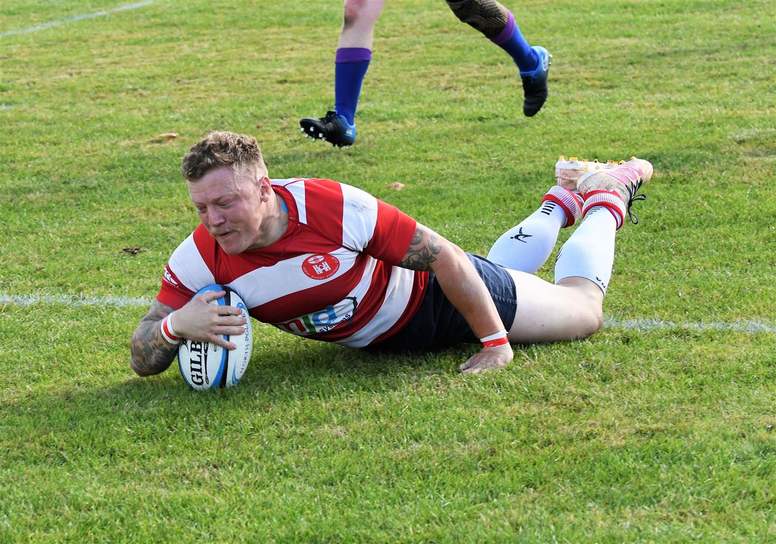 Lewis Scott scores one of his four tries. Picture: James Officer