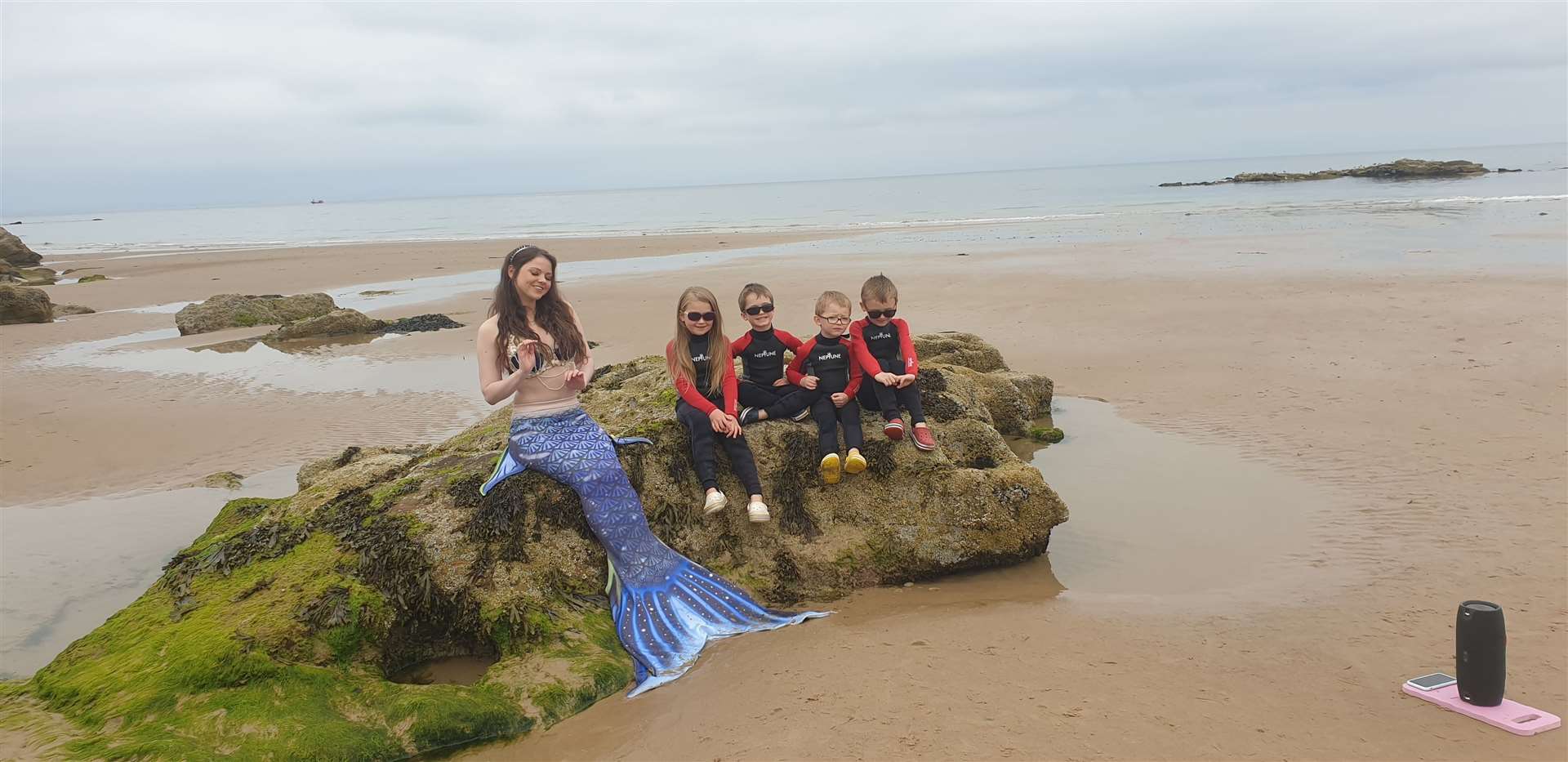 The Young family - Eilidh, Ruaridh, Aonghus and Padruig meet the Mermaid. The family, from Udny Green, are on holiday at Lossiemouth this week.