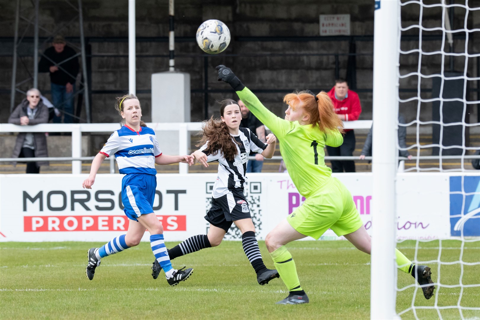 Elgin City's Orla Scott forces a good save from Dyce keeper Faith Jessica Maan.Elgin City Women (5) vs Dyce Women FC (5) - SWFL North 2023/24 - Borough Briggs, Elgin 5/5/2024.Picture: Daniel Forsyth.