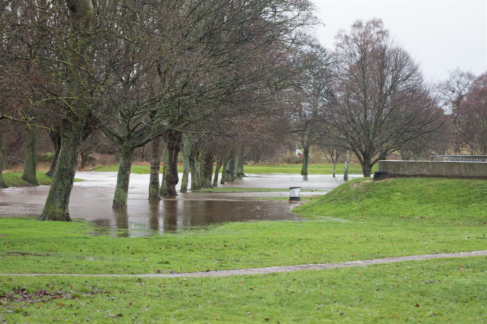 The river Lossiemouth bursts its banks in Cooper park, Elgin...Picture: Becky Saunderson..