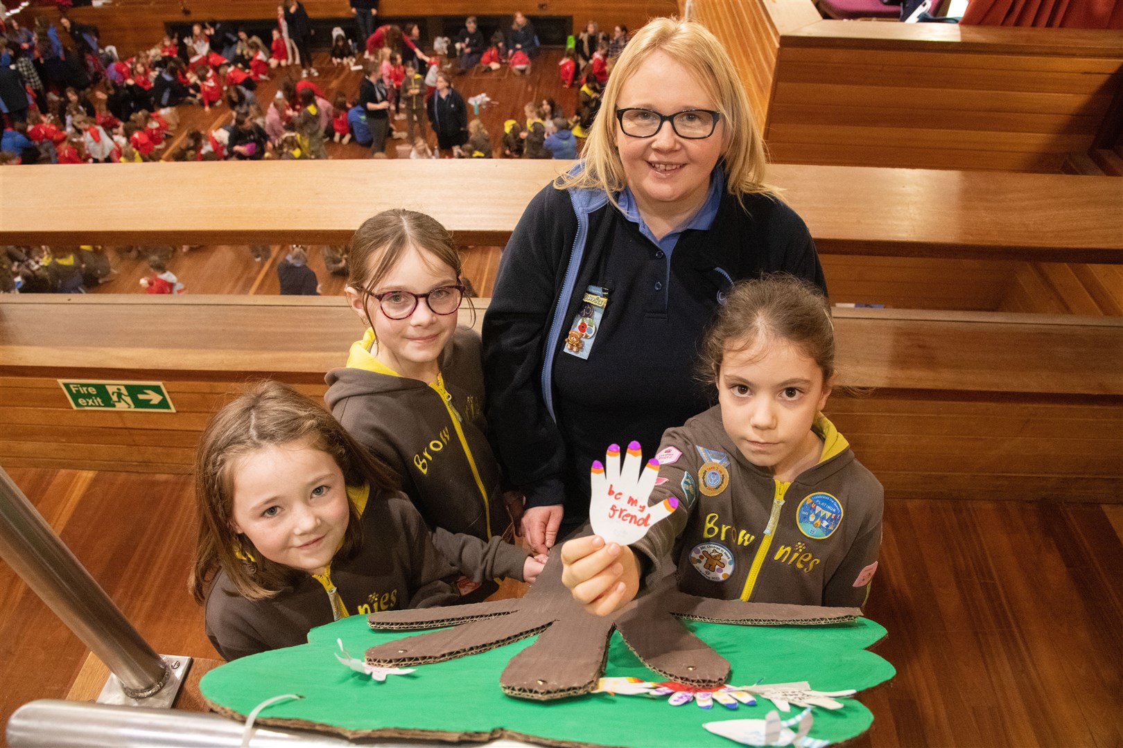 From left; Robyn Byries, Amy Cruickshank, Lorraine Mighten and Faye Dickson from the 2nd New Elgin Brownies group...Hundreds of Rainbows, Brownies and Guides gather in the Elgin Town Hall to celebrate World Thinking Day...Picture: Daniel Forsyth..