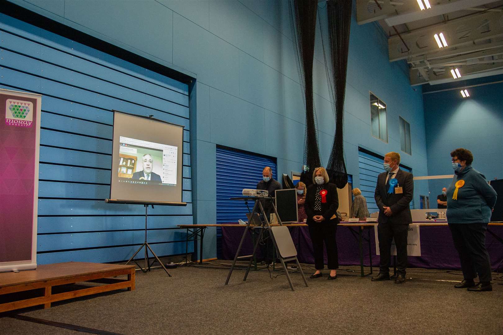 Candidates hear the results, with winner Richard Lochhead coming in via video link. Picture: Daniel Forsyth..