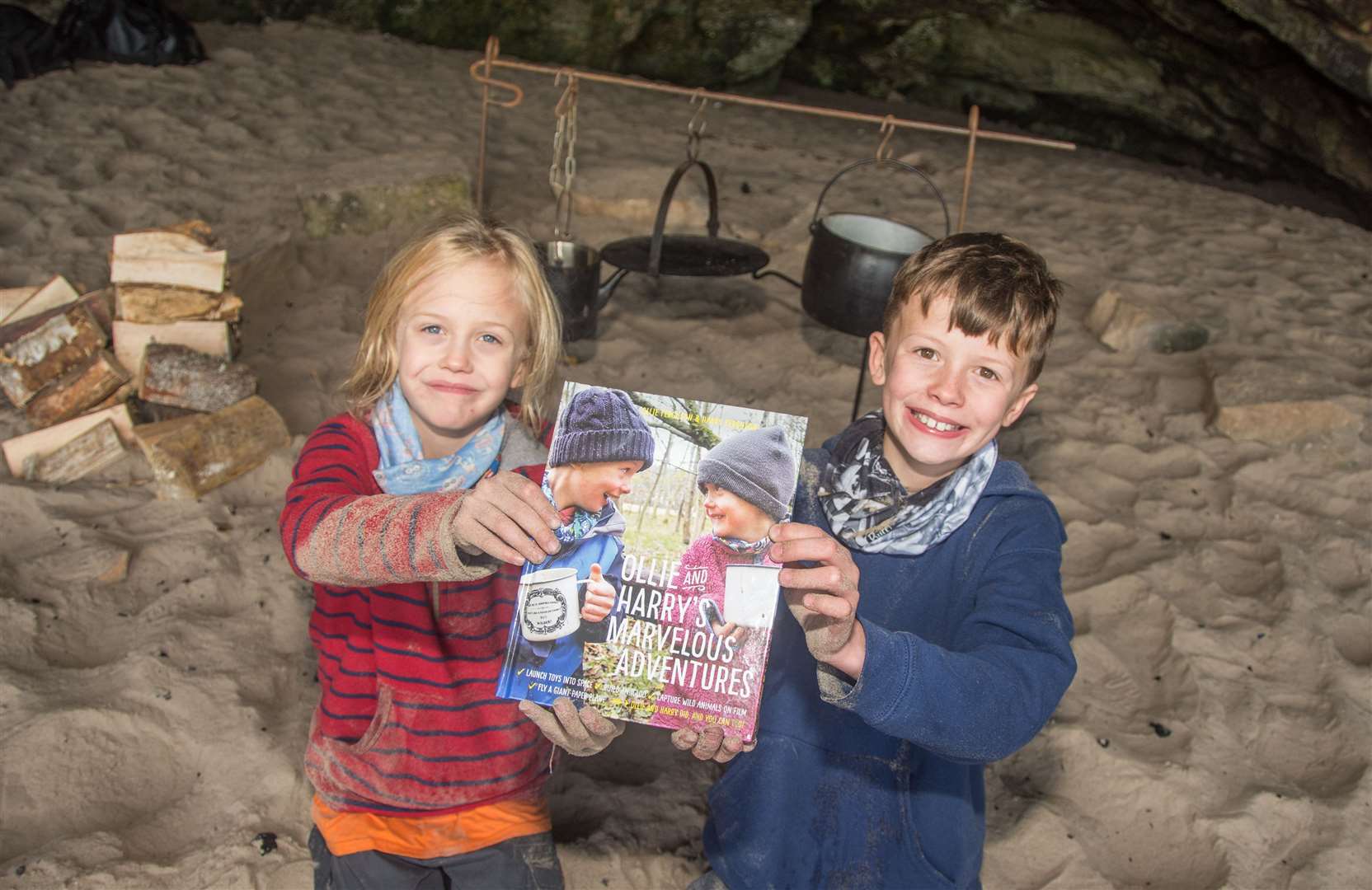 Harry (left) and Ollie (right) celebrate their adventure book launch with a camp at Covesea. Picture: Becky Saunderson.