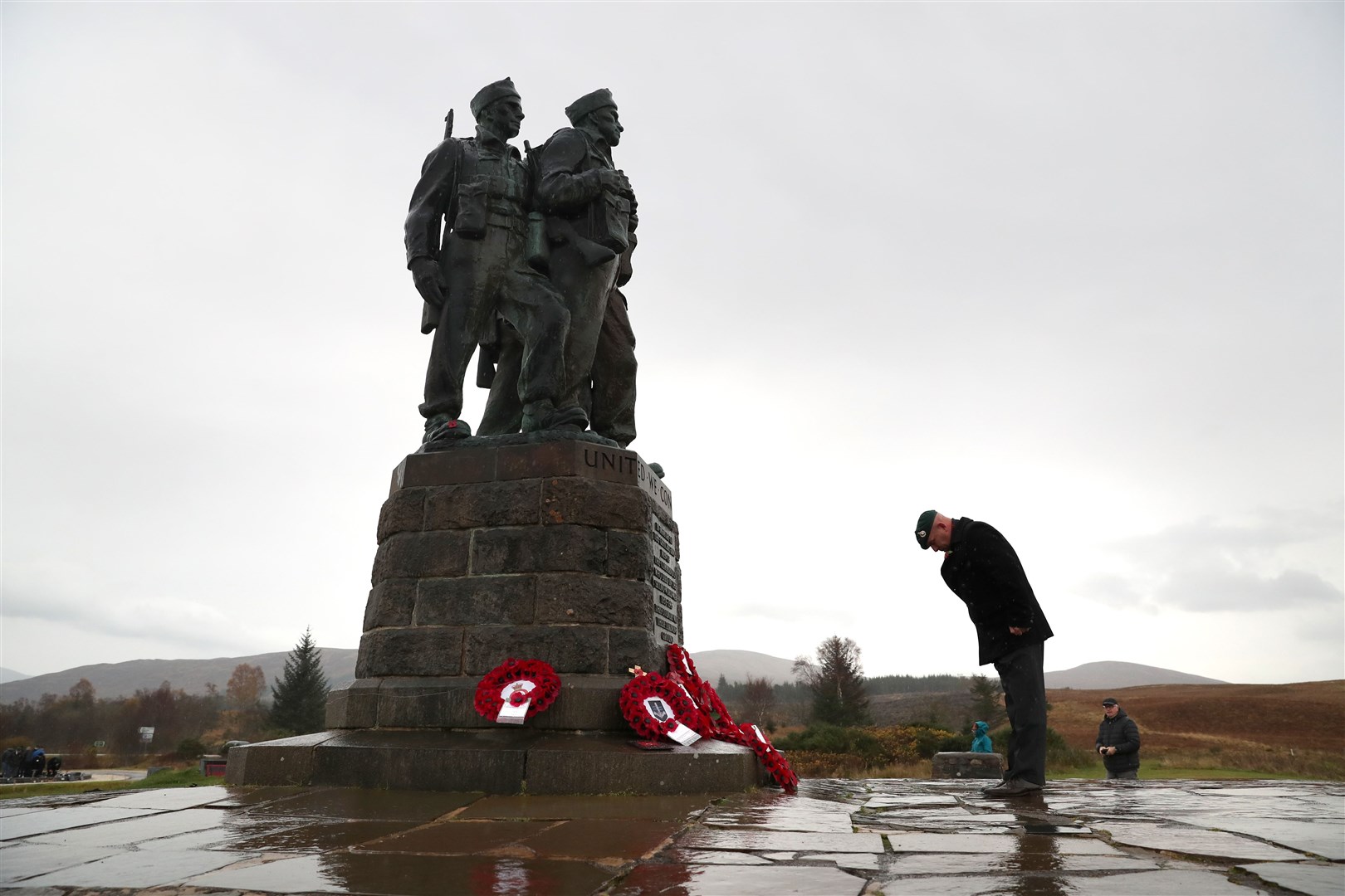 A small number of serving and former Royal Marine Commandos at the Commando Memorial at Spean Bridge, near Fort William, for the annual Remembrance Sunday ceremony (Andrew Milligan/PA)