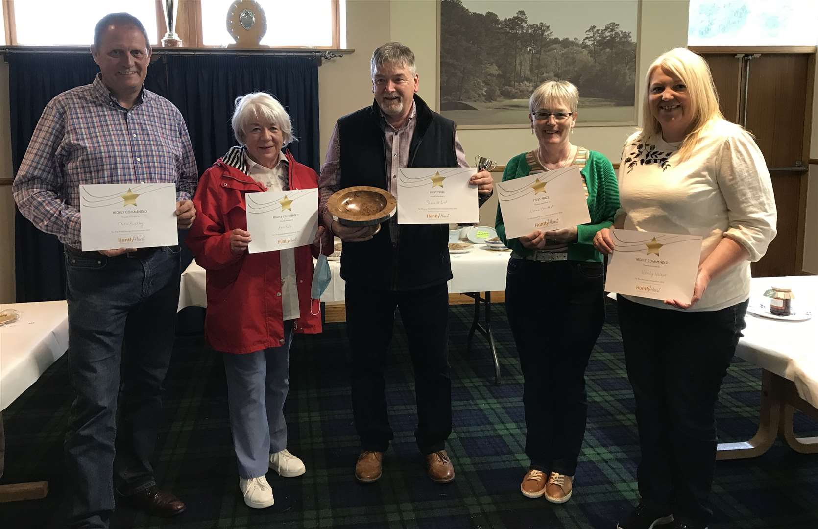 World Stovies champion, Shaun McLeod, centre with other food competition winners.