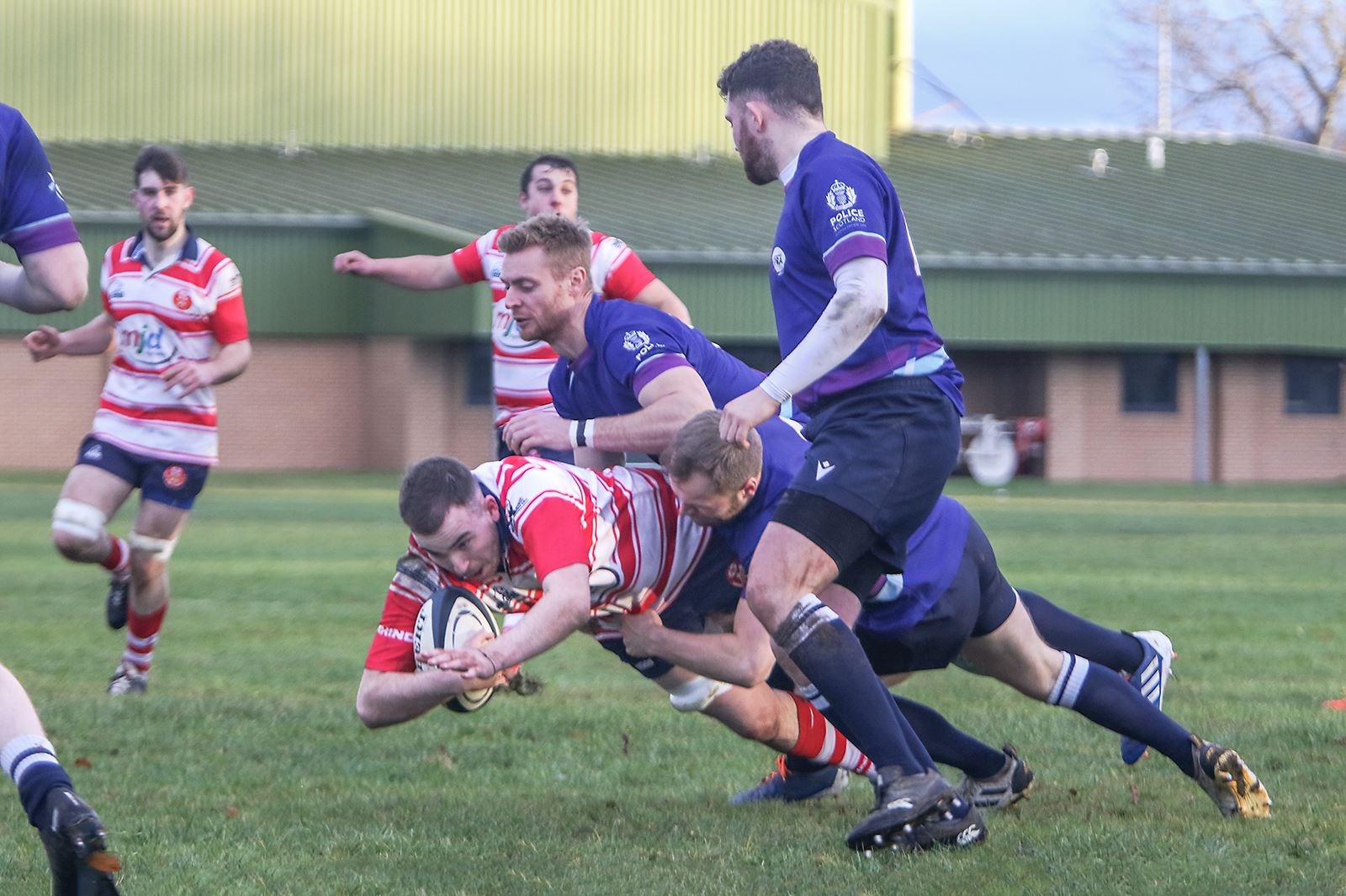 Lewis Small being tackled to ground. Picture: John MacGregor