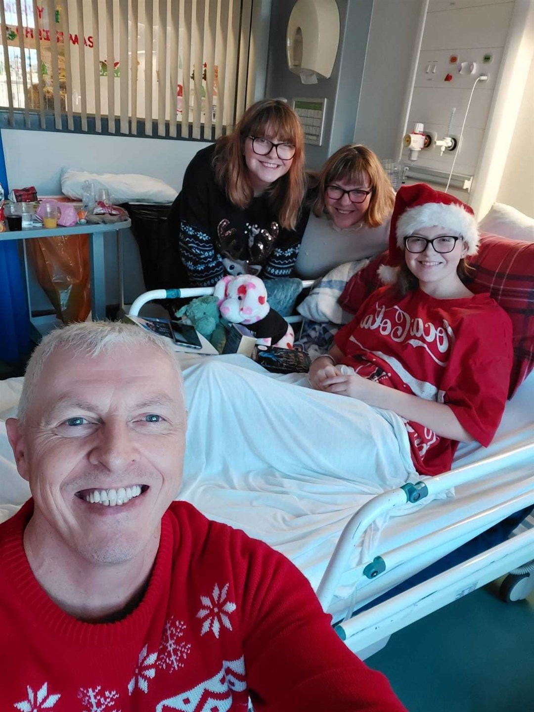 Abbie in hospital with the family last Christmas. Picture: Teenage Cancer Trust