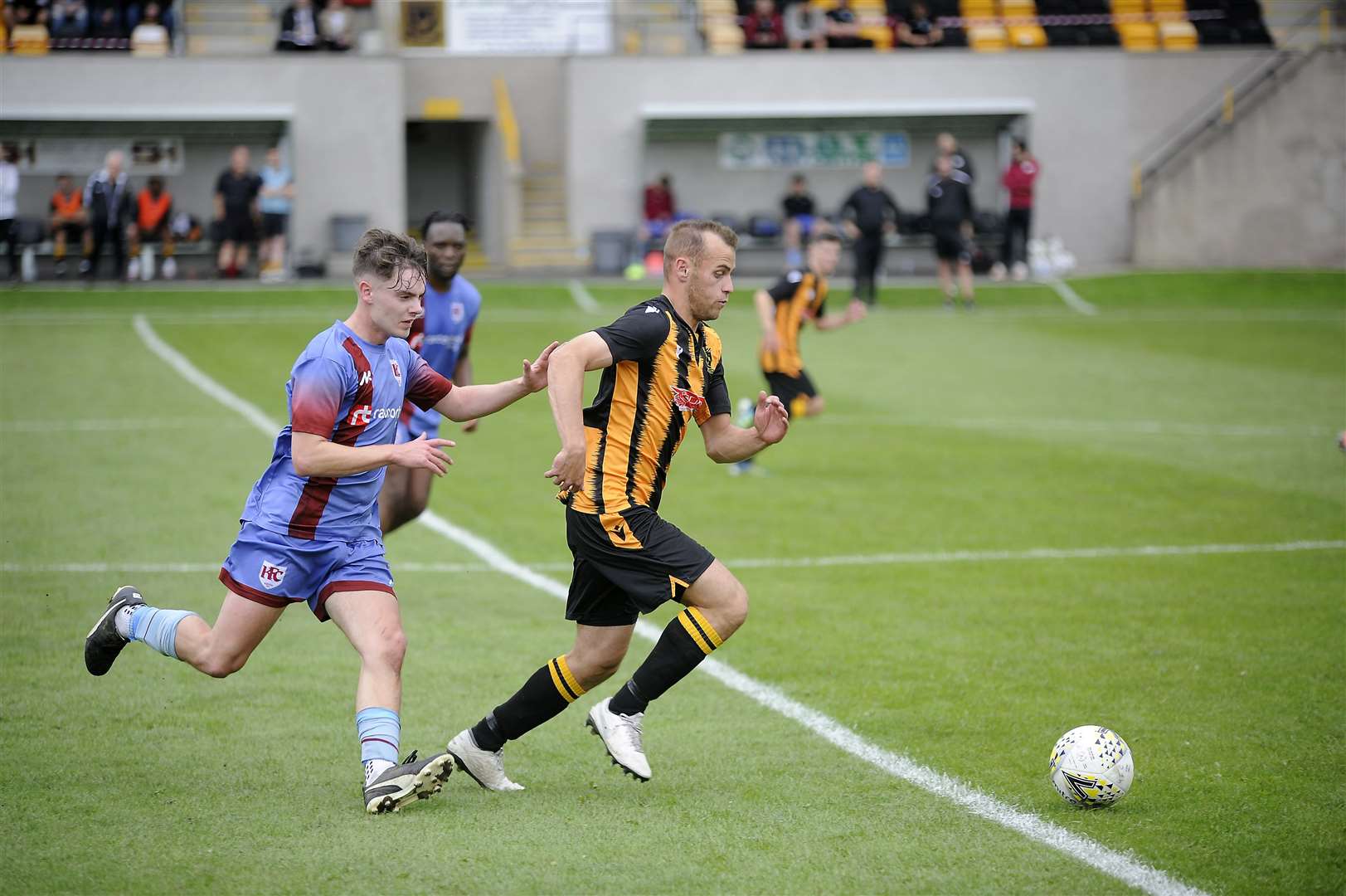 Keith's Tom Andrews chases down Greg Buchan. Picture: Becky Saunderson