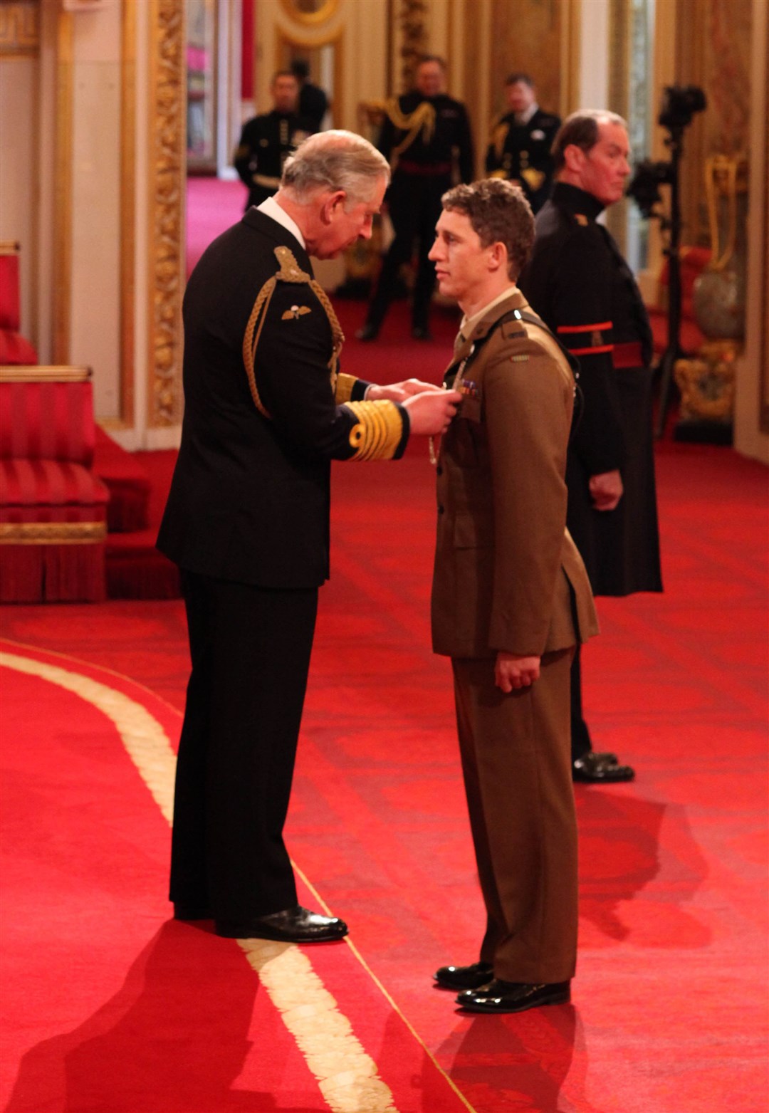 Mr Cutterham was presented with the Conspicuous Gallantry Cross by the Prince of Wales (Lewis Whyld/PA)