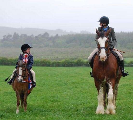 Lilly, from Rothes, on her pony, Ted, with Sam Winn, from Newmill, on Bulwark Bay, in 2019.