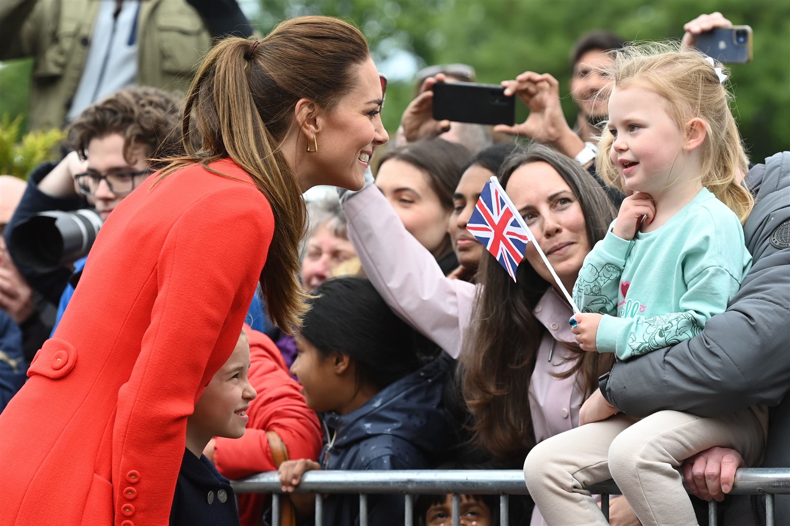 The Duchess of Cambridge and Princess Charlotte meet well wishers during their visit to Cardiff Castle (Ashley Crowden/PA)