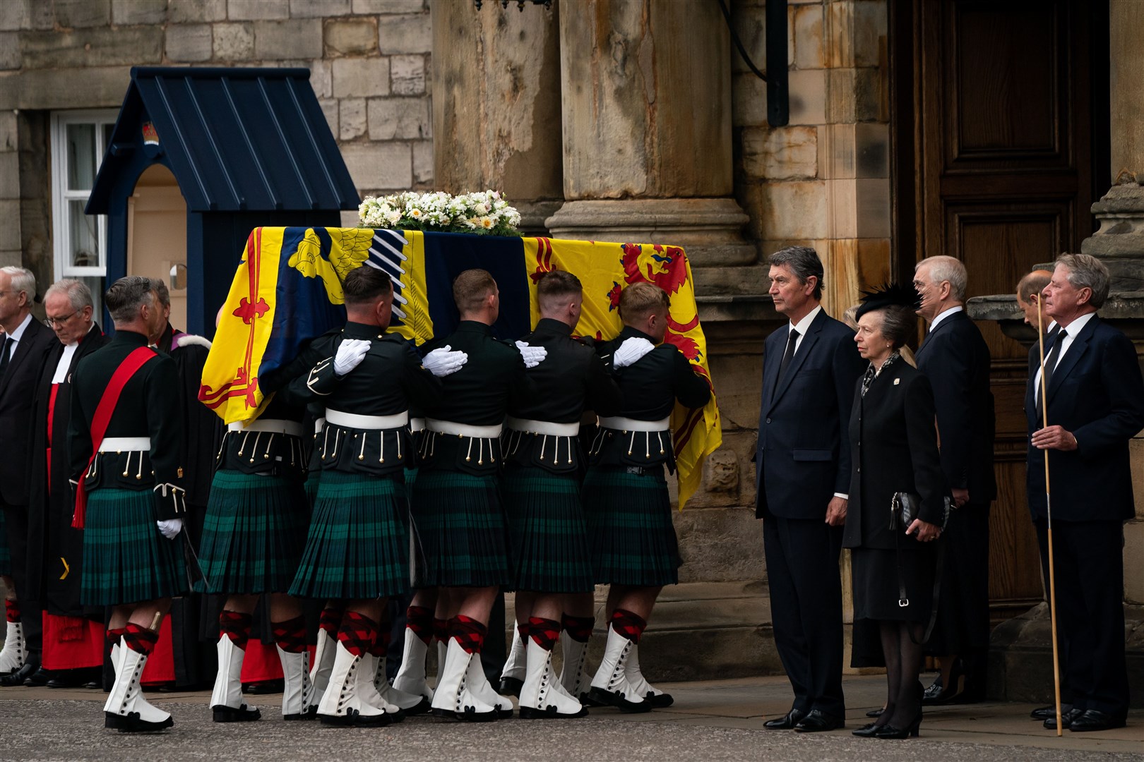 The coffin, draped with the Royal Standard of Scotland, was taken to the Palace of Holyroodhouse in Edinburgh (Aaron Chown/PA)