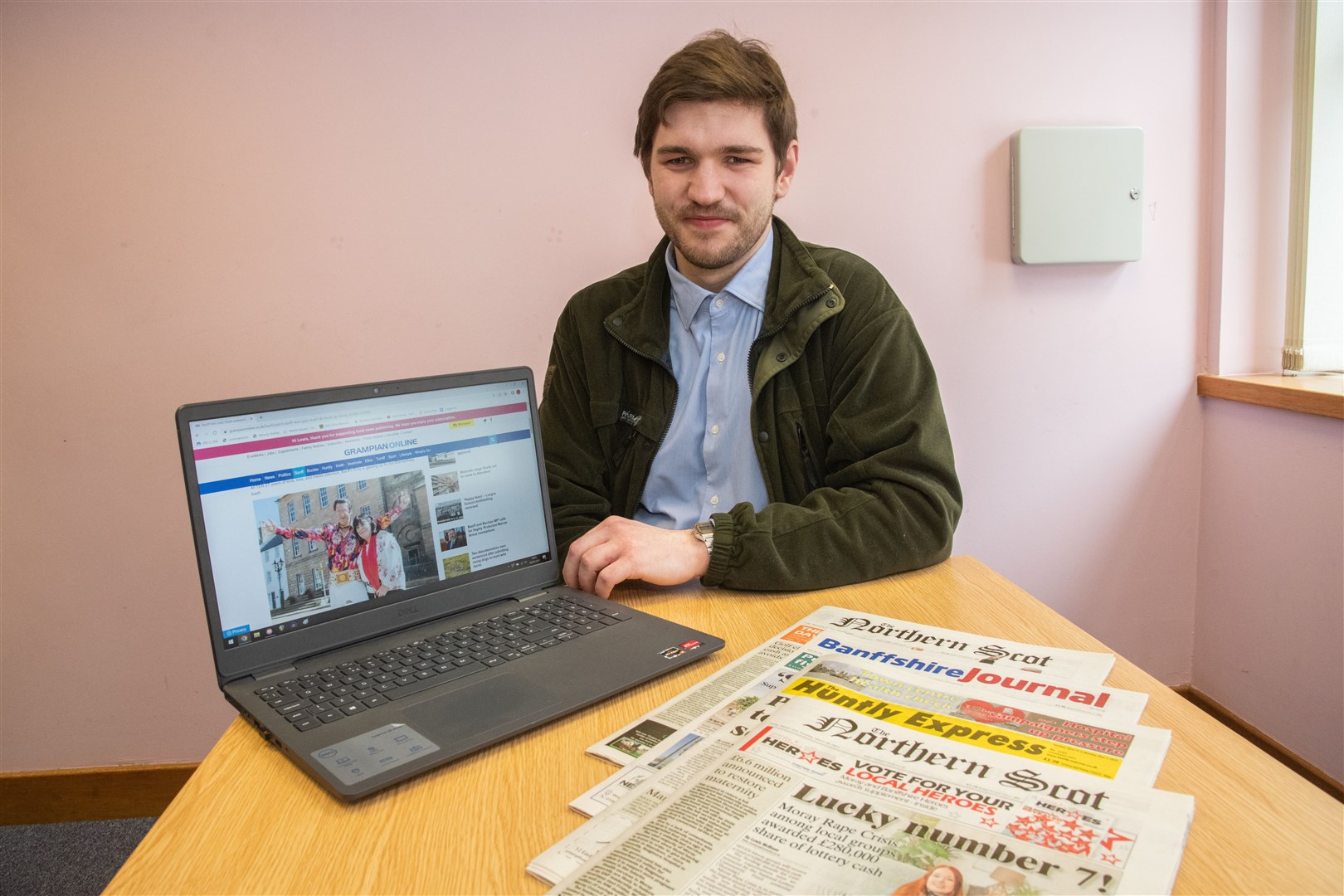 Lewis McBlane with the newspaper cuttings that have seen him nominated for awards ..Picture: Daniel Forsyth..