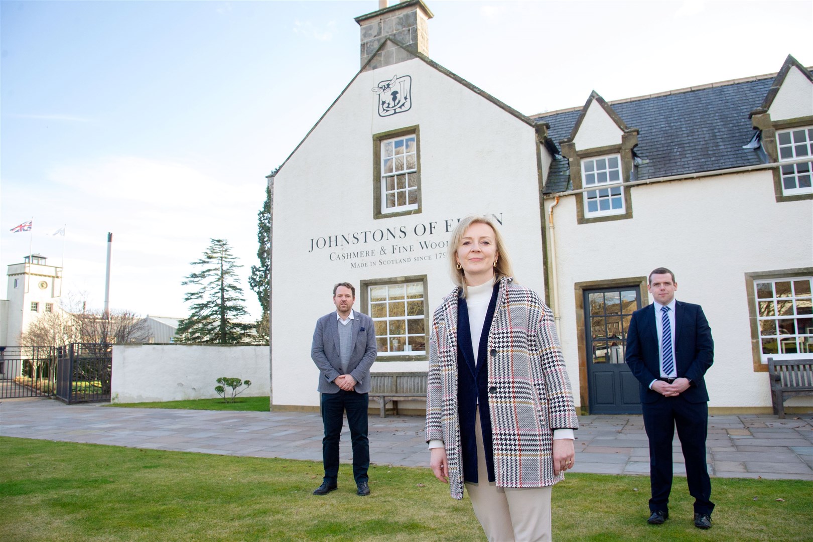 Left to Right: Simon Cotton (Chief Executive of Johnstons of Elgin), Liz Truss and Moray MP and Scottish Conservative leader Douglas Ross...Secretary of State for International Trade MP Liz Truss visits Johnston's of Elgin to hear about thier international trading plans...Picture: Daniel Forsyth..