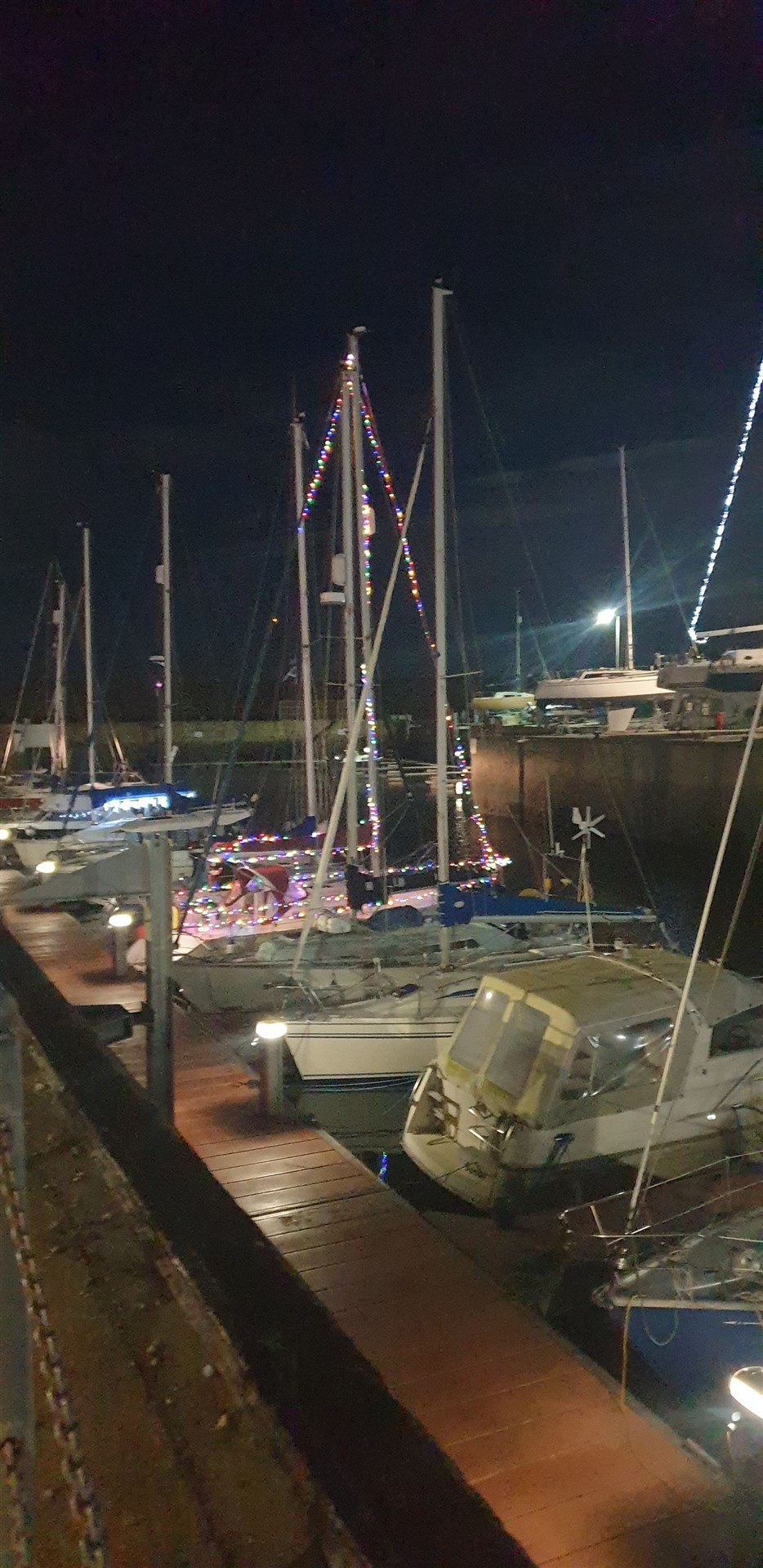 Even some of the yachts in the marina are illuminated for Christmas.