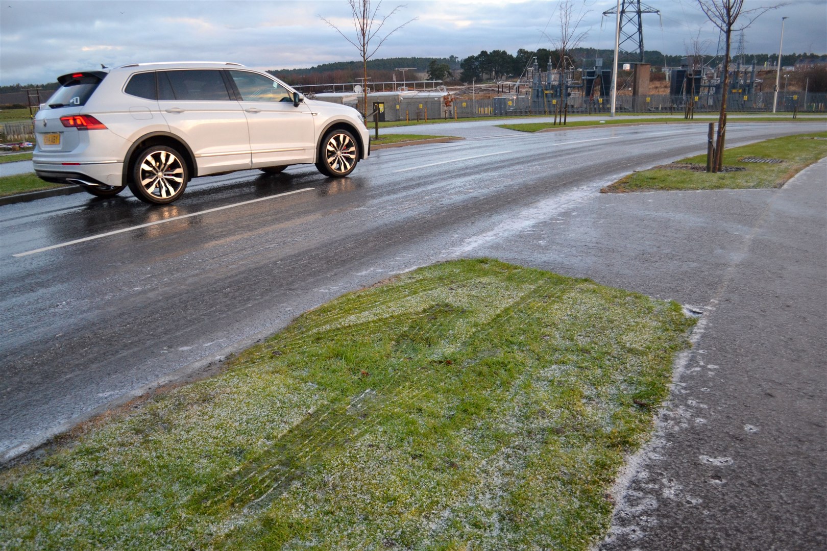 West Covesea Road is iced over, with cars forced to drive at a slow pace. Picture: Tyler Mcneil