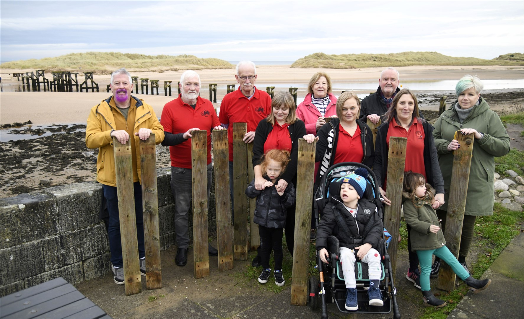 Members from Elgin Men's Shed, Lossiemouth Business Association, Lossiemouth Community Development Trust and The Ladybird Developmental Group are selling parts of the old bridge at Lossiemouth for charities...Picture: Beth Taylor.