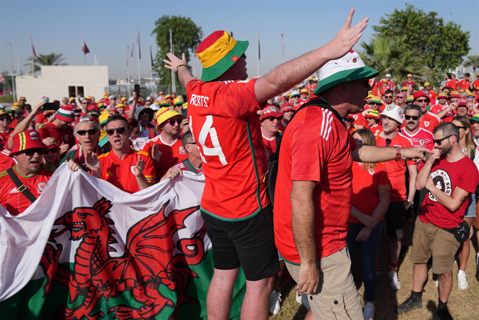 Wales supporters gather at the Corniche Walk Park in Qatar ahead of their team’s Group B game against Iran (Jonathan Brady/PA)