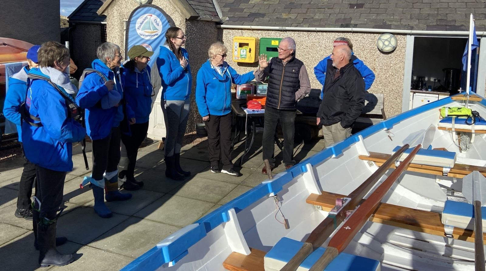 The skiff Morven is brought out in preparation for a short trip round Craigenroan. Picture: FWSC