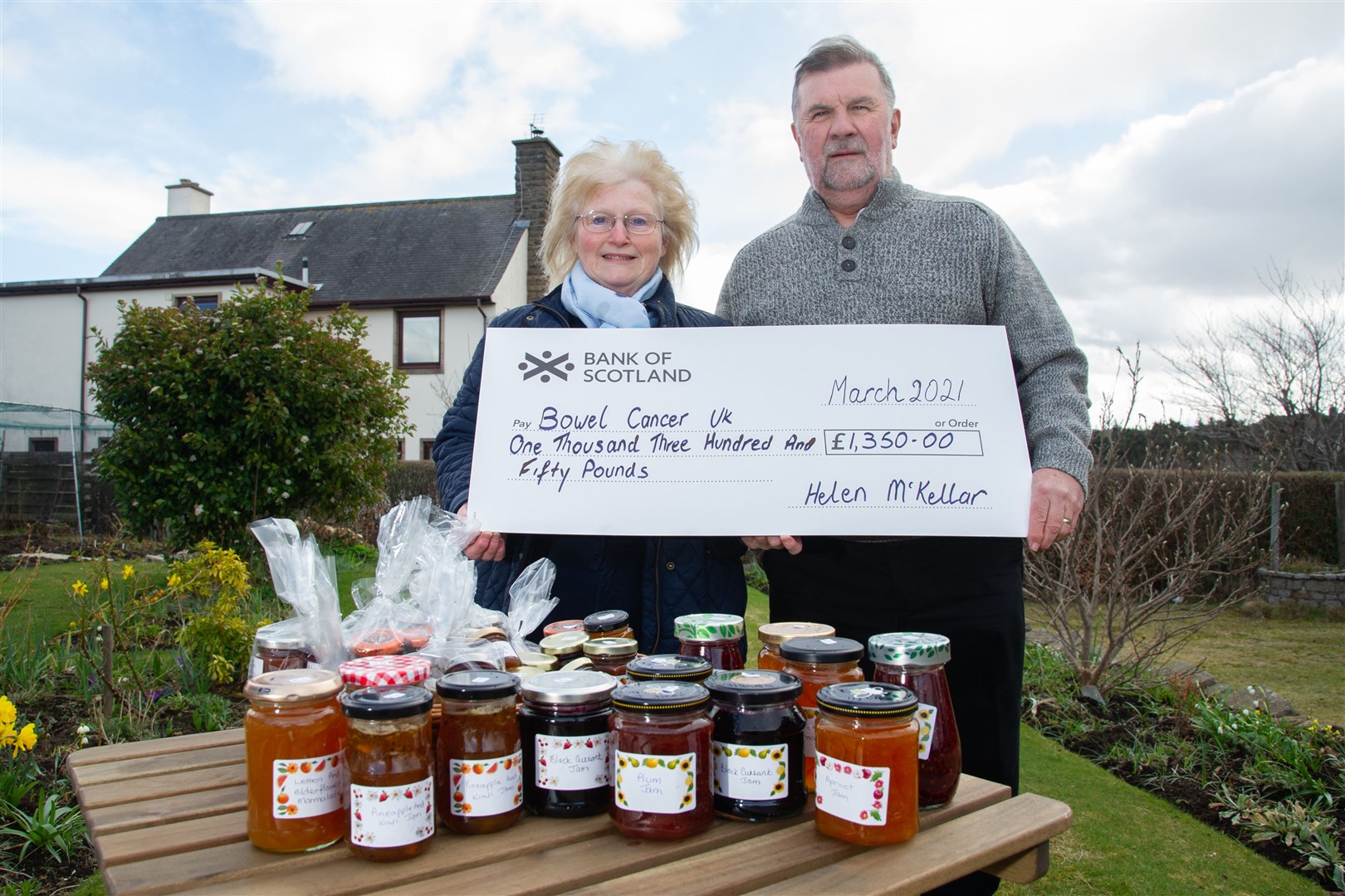 Helen McKellar, joined by husband Duncan, has donated £1350 to Bowel Cancer UK after making and selling jam. She is already busy making more to raise money for a different charity this year. ..Picture: Daniel Forsyth..