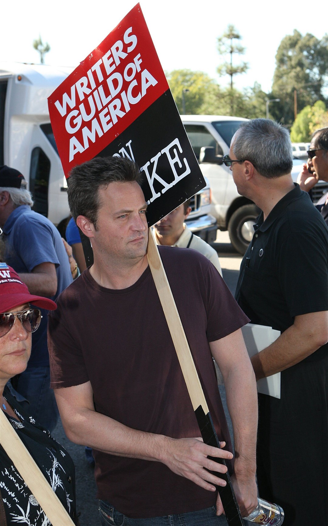 Matthew Perry in 2007 showing his support for writers on strike (Ian West/PA)