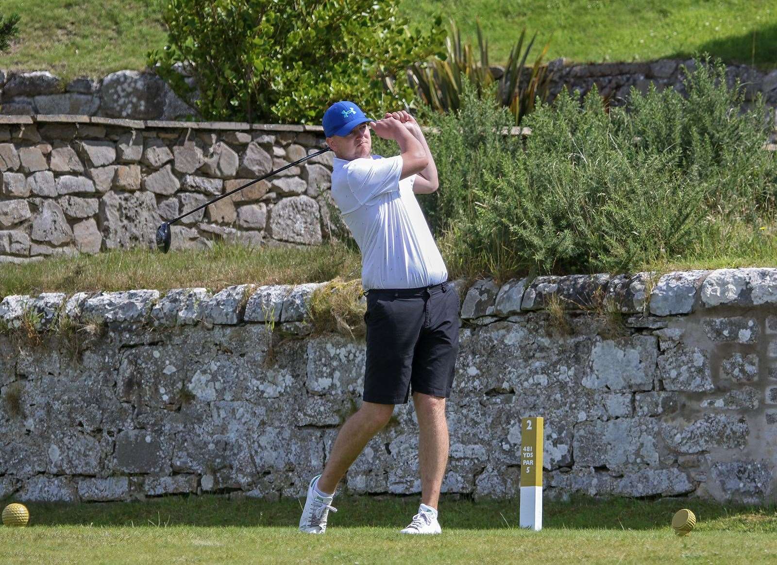 Jack McNeilly tees off at the second hole. Picture: John MacGregor