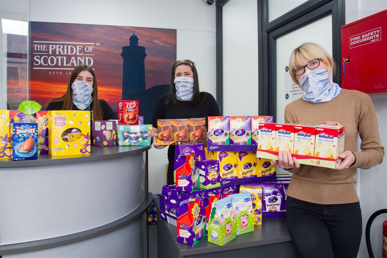 Buckie's Associated Seafoods donate Easter Eggs towards the Northern Scot's Easter Appeal. ..left to Right: Drew Niven, Alice Adshead and Lyudmila Taulier. Picture: Daniel Forsyth