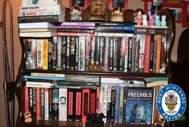 Books, including many about serial killers, discovered by police at the home of Nathan Maynard-Ellis and David Leesley (West Midands Police/PA)